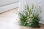Luxury wedding flower meadow sitting at the base of the table at this luxury Seattle wedding